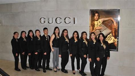 gucci employees holding|gucci employee uniform.